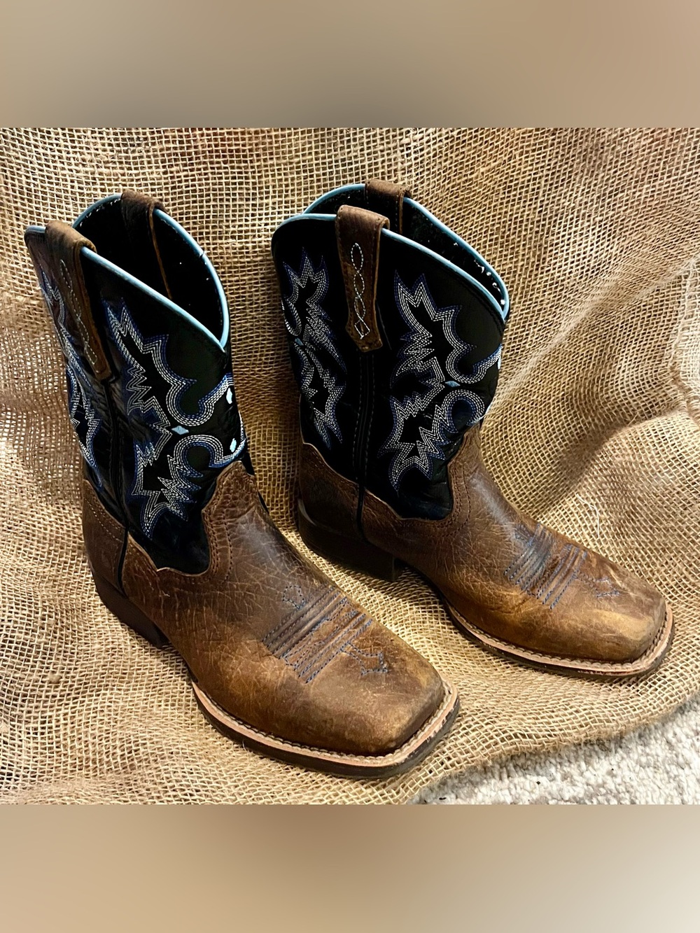 Ariat Brown Leather Kids Cowboy Boots with Black Shaft and Blue Stitching